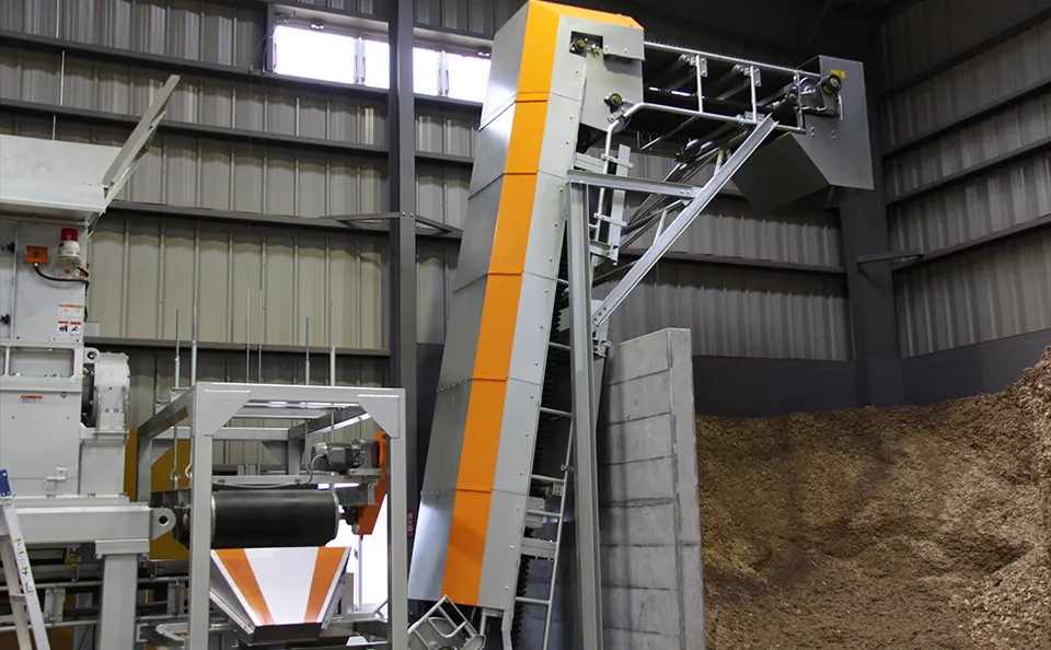 粉塵対策用特殊配送フライトコンベア